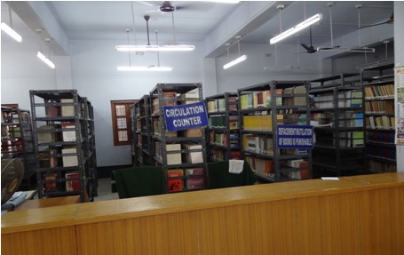 Library and Reading Room with book shelves, circulation counter and reading area