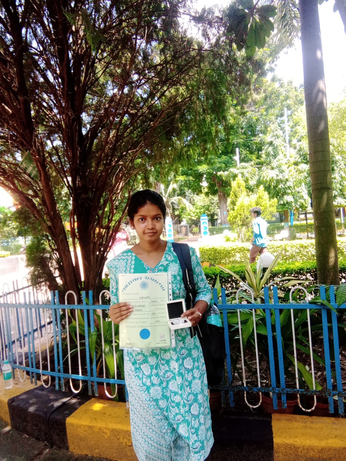 Nilima Bera with her Vidyasagar University certificate and medal