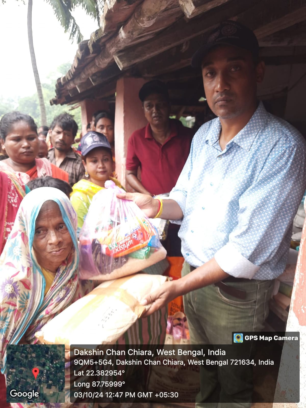 Food item and clothes distribution among flood affected people of Dakhin Chachiara village