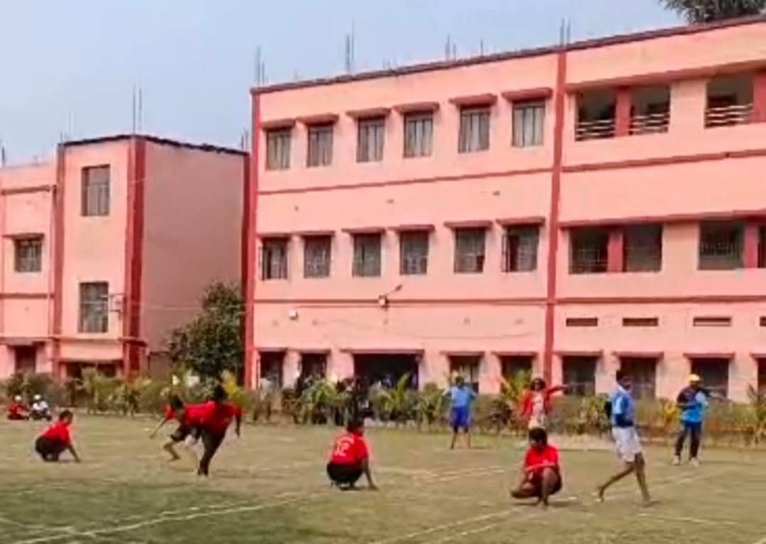 Students playing a game on the college sports field