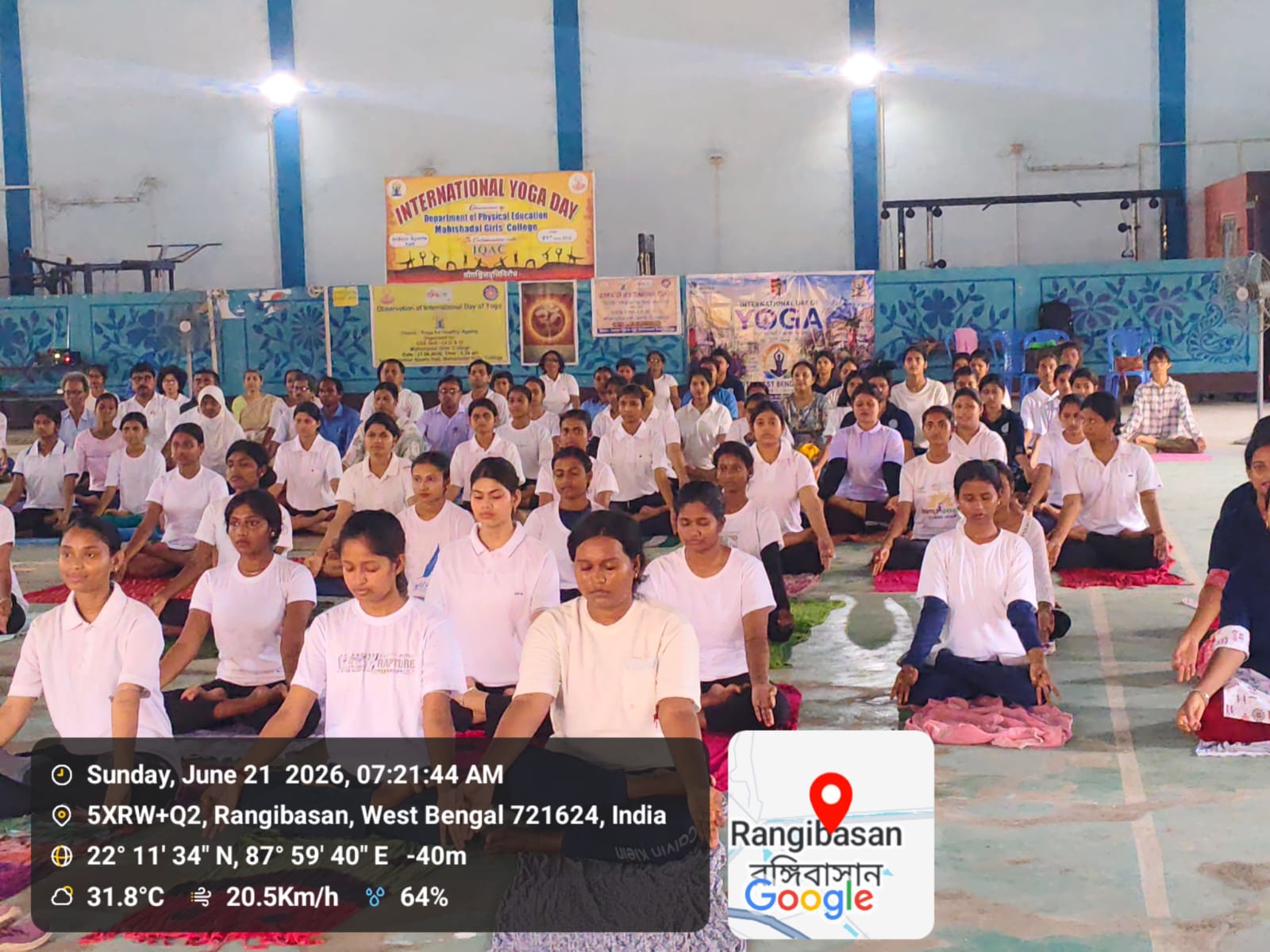 Students seated in meditation pose during yoga session